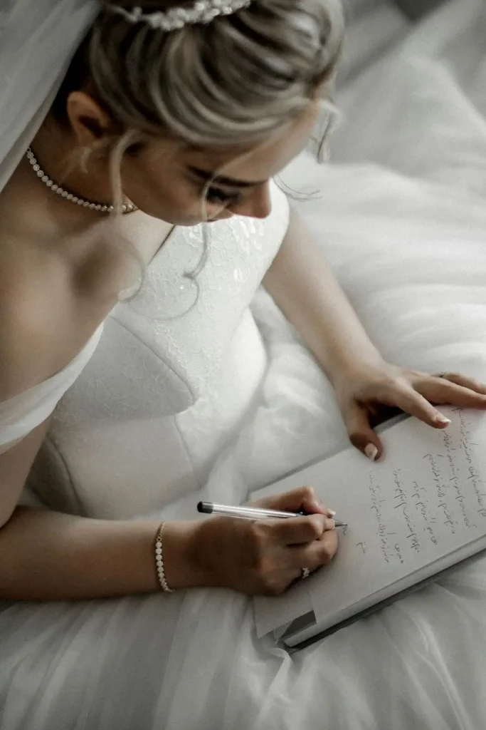 Bride with a notepad checking off her final to-dos